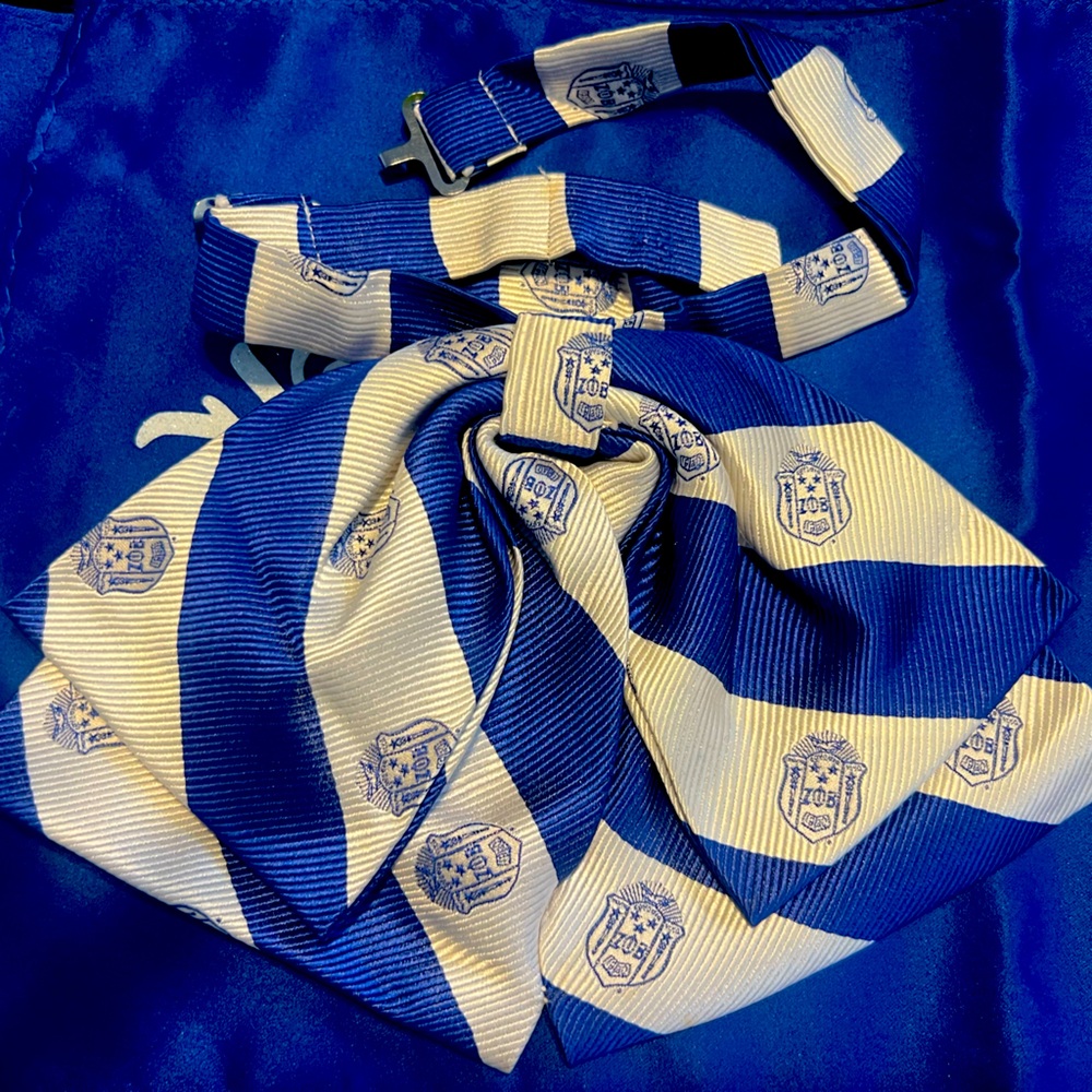 Zeta Phi Beta sorority bow tie with sorority shield.